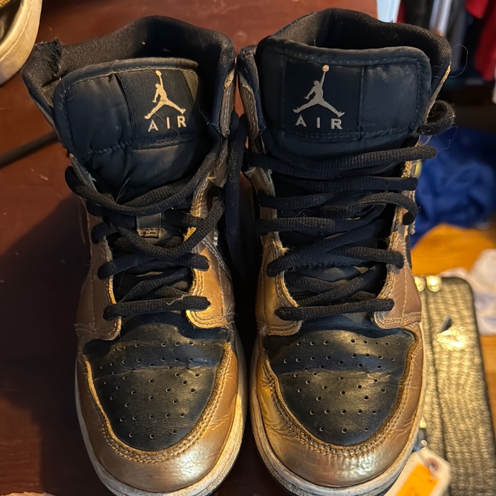 Nike Air High-Top Sneakers in Black and Gold